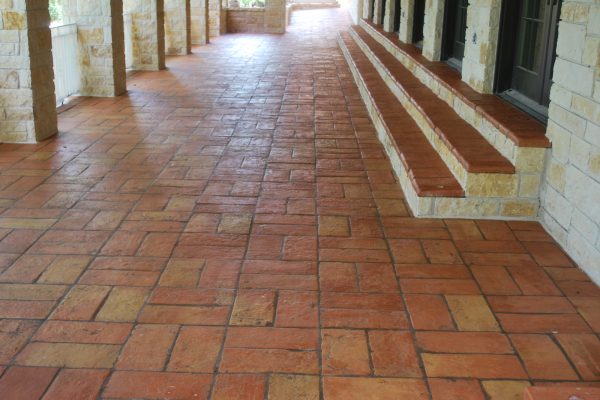 Handmade terracotta tile in the natural color installed on back patio