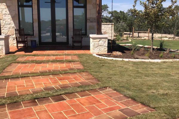 Handmade French terracotta tile in the natural and cafe color installed on patio