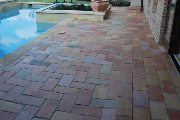 9X14" French terracotta tile in color mix installed on pool deck