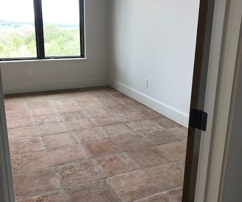 16X16" Cafe terracotta tile installed on bedroom floor
