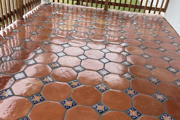 Saltillo Tile Octagon and dot with Talavera inserts installed on back patio