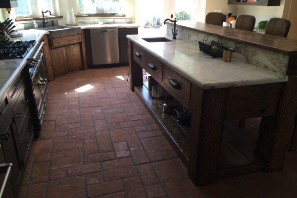 handmade terracotta tile installed on kitchen floor