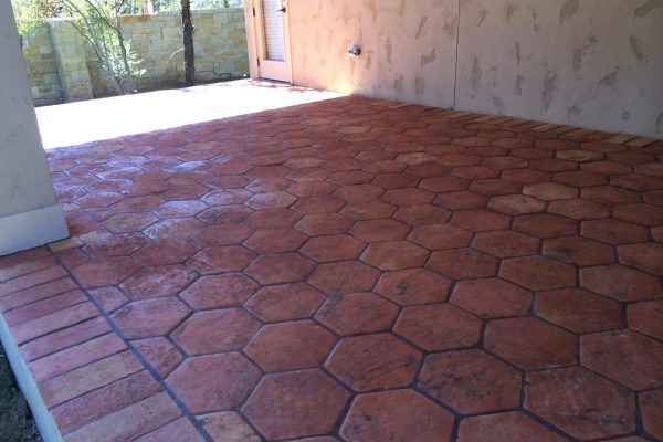 12" Hexagon heritage terracotta tile installed on a patio in San Antonio, Texas