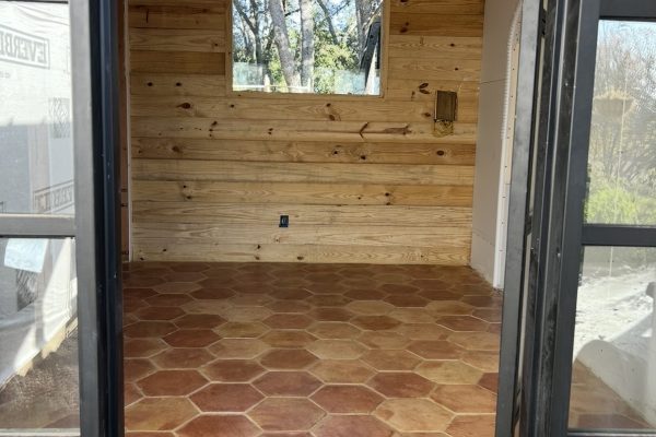 12" Hexagon handmade terracotta tile installed on a guest house floor in San Antonio, Texas