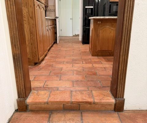 8X16" Terracotta Tile in the Heritage finish installed kitchen floor with decorative tile border in canyon Lake, Texas